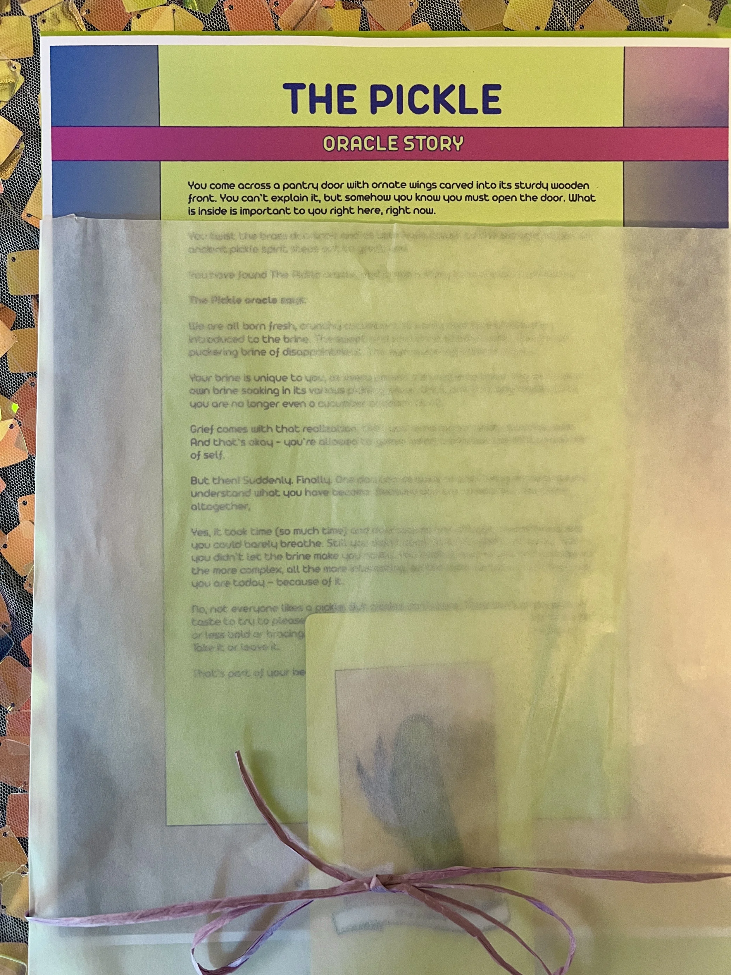 The Pickle from Found Oracles printed story sheet peeking out of its glassine sleeve with story card visible inside.