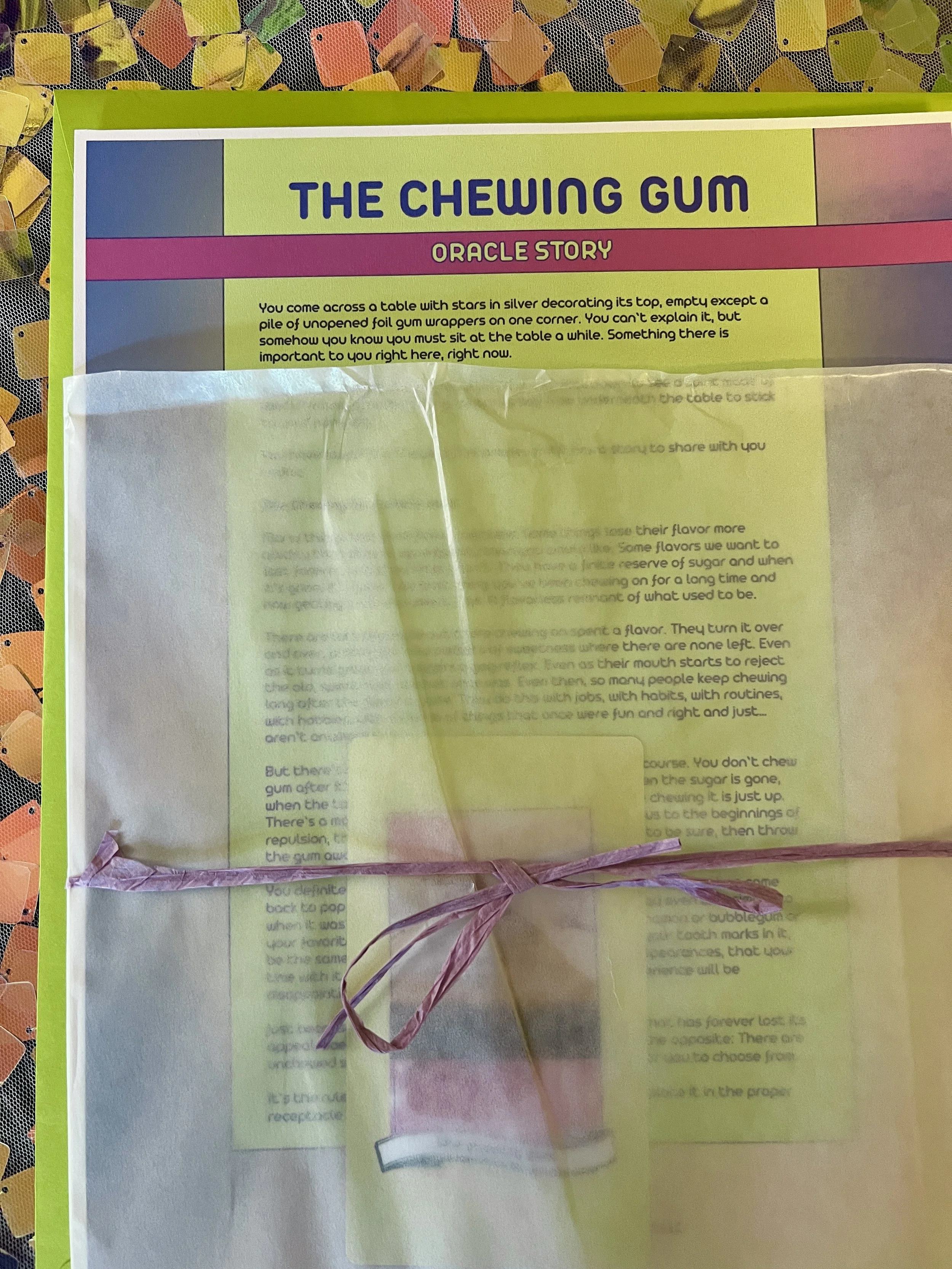 The Chewing Gum from Found Oracles printed story sheet peeking out of its glassine sleeve with story card visible inside.