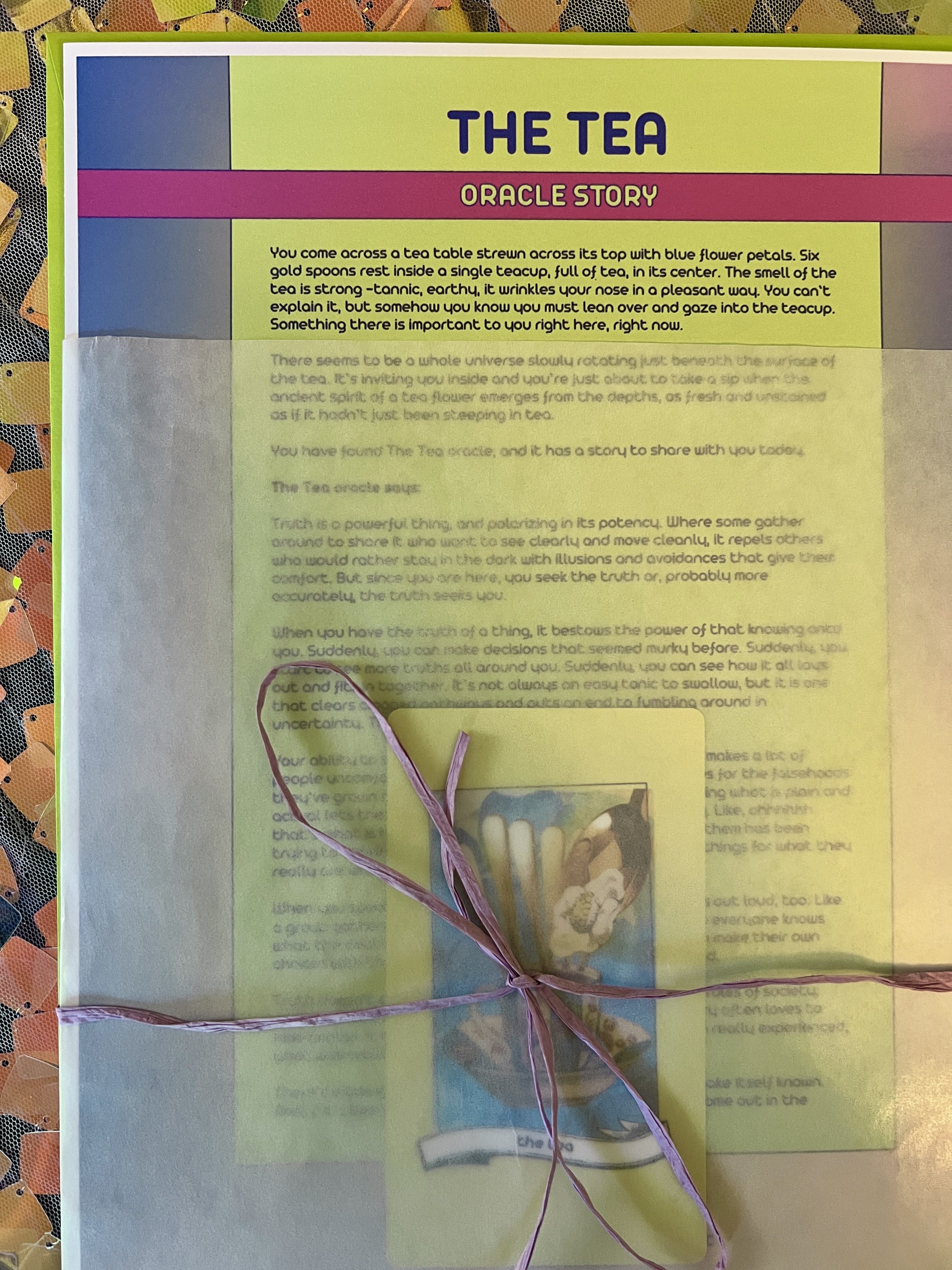The Tea from Found Oracles printed story sheet peeking out of its glassine sleeve with story card visible inside.