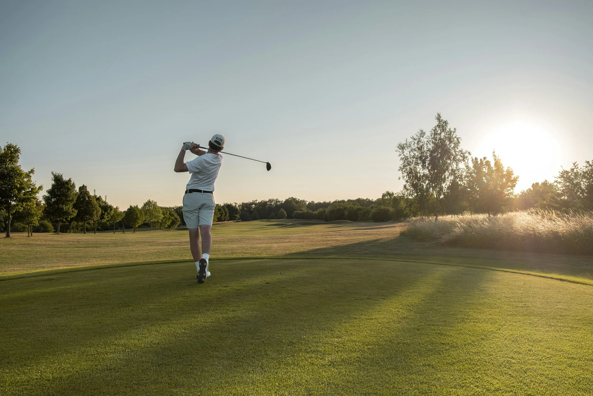 Golf Back Pain Treatment: Fix Your Swing