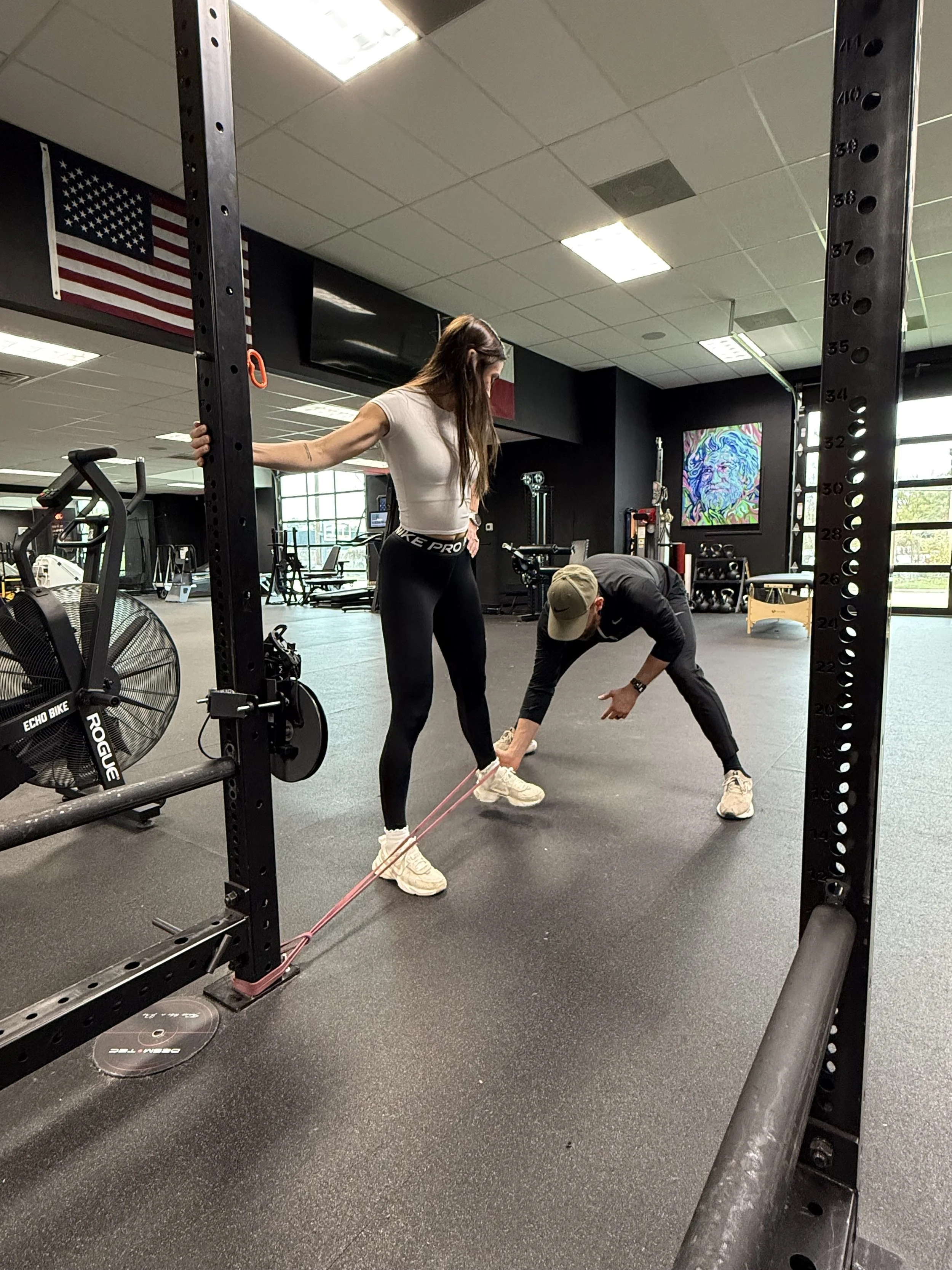 Corrective exercises and one on one coaching from a chiropractor to their patient