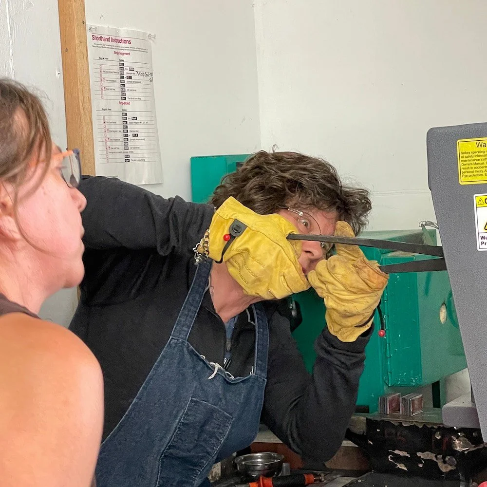 Hot metal in place now; I watch the positioning.