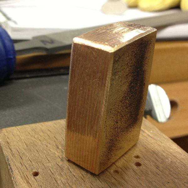 Trimmed billet - needs to be forged down to about half its current thickness. But I don't see any hammers ...