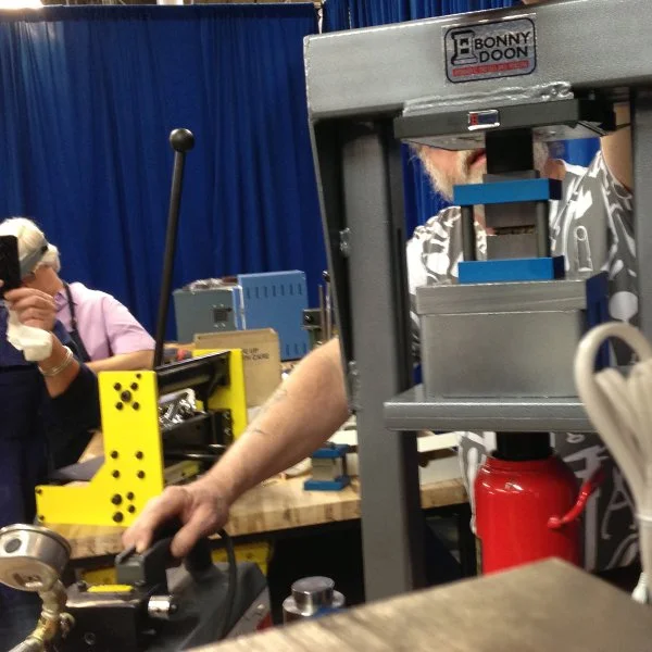Jim using the press buddy - a faster and quieter way to forge down the billet. Look Ma, no hammers!