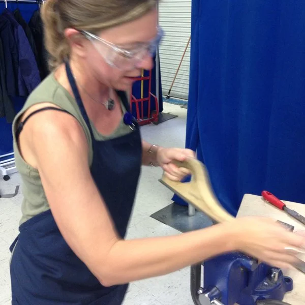 Trimming down the edges of the billet to get to clean metal - fun with this nice rough file.