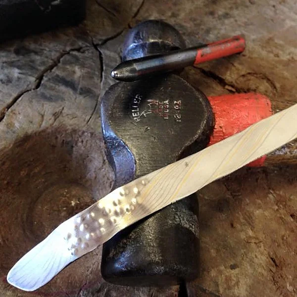 After rolling to about 17 gauge, stamp patterning begins.