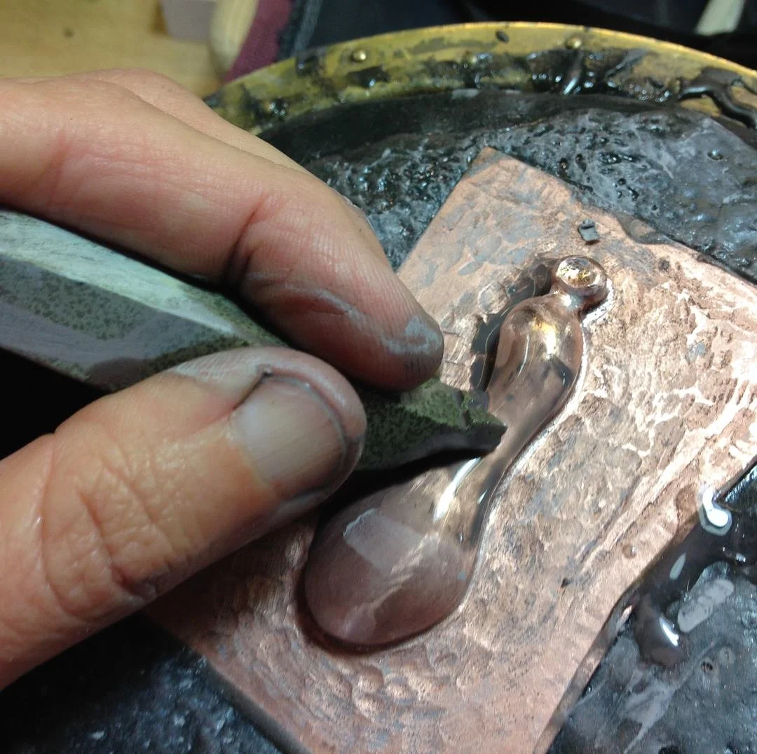  Scotch-stoning the surface. Done wet, the stone breaks down and forms a slurry with the water. Very precise and even finishing. 