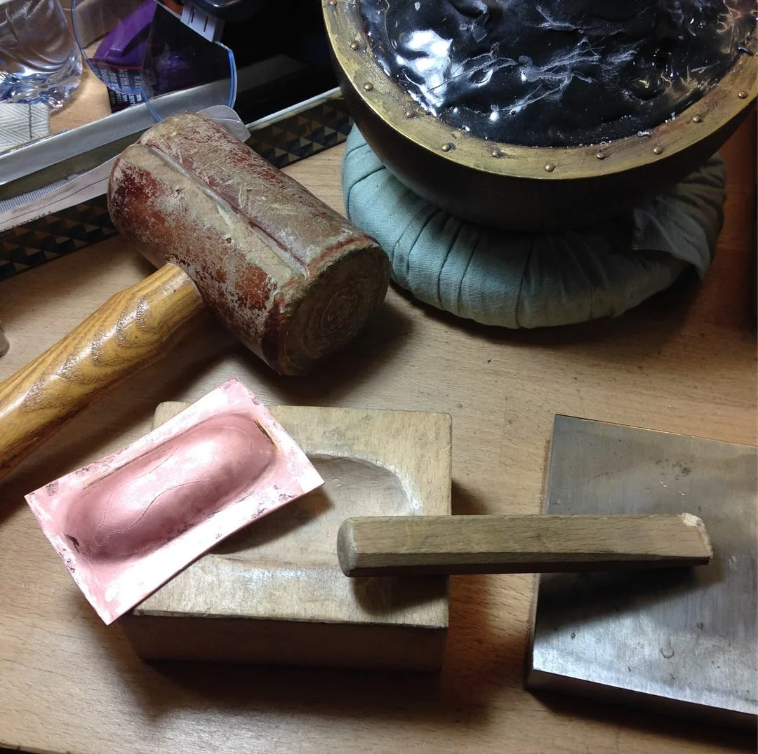  This shows how I pushed the copper up from the back using the wooden block and punch. Note how general the shape is - just an oval, doesn't even follow the curves of the gourd at all. Many pieces could use this same generic wooden block. 