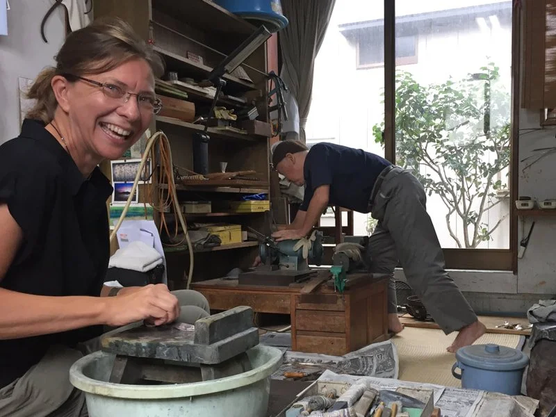  Then we went down the hall to his workshop, and he set me to work polishing spoons! 