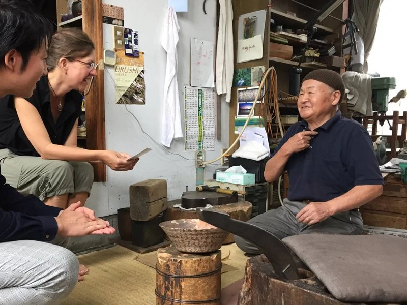  He's telling us he has to go to Tokyo tomorrow, to make an appearance at a show he's in at Mitsukoshi Dept store. In foreground is the stake in place, ready to raise. He'll sit on the pillow to raise. 