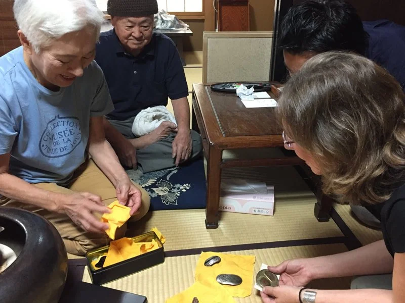  More gifts?! They got out this stack of what he called 'brooches that don't sell." Told us to pick two! 