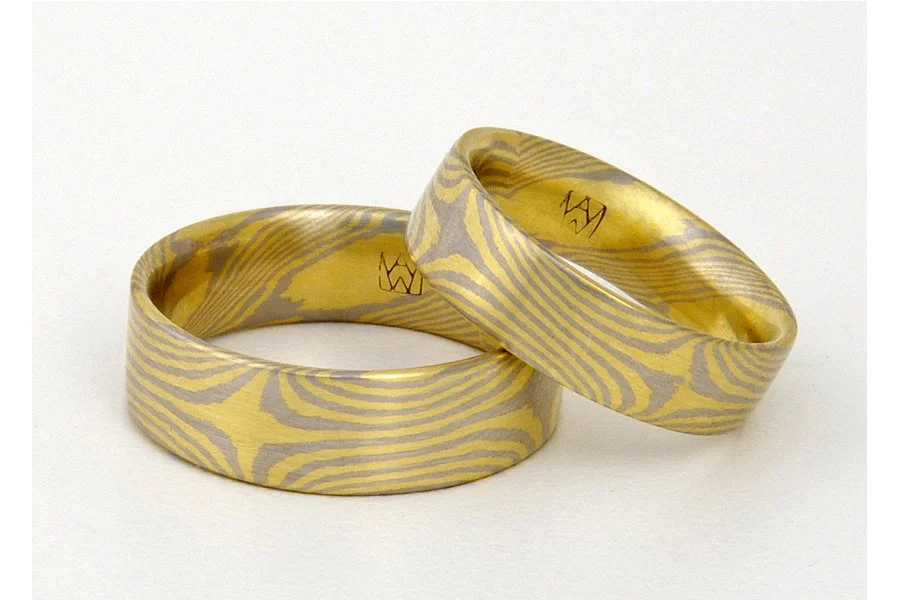 This custom color combination, 18k yellow gold with 950 palladium is one of my favorite to work with but also on the upper end of the price range. It is a dense, magnificent feeling metal combination that will turn heads and last a lifetime. Star pat