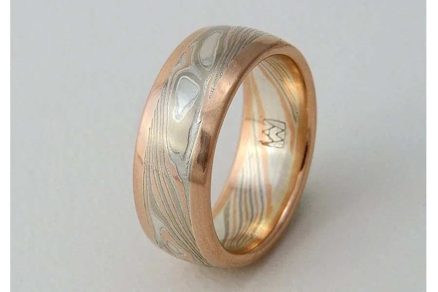 Tsuchi (Earth) ~ Central core of mokume, with patterning that mirrors the complex metamorphic and topological patterns of our planet. Visually grounded and framed with rose, yellow or white gold edging. Looks best from 6 to 8mm wide.