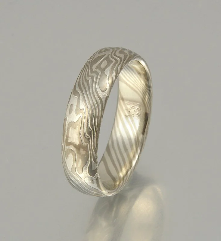 Color choice PS - palladium 500 and sterling silver, low-dome profile, etched.