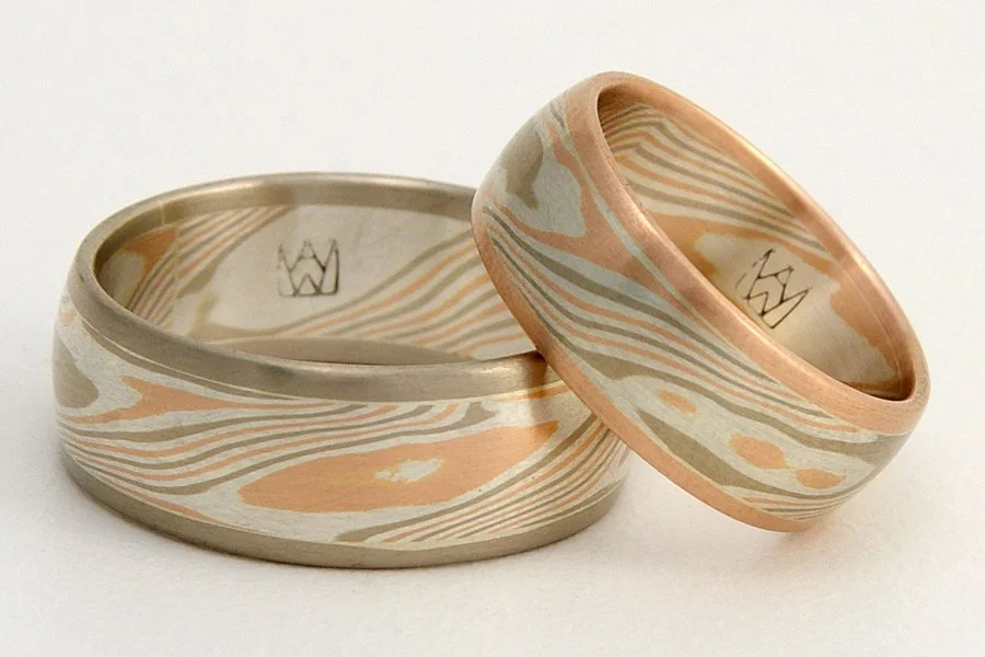Tsuchi (Earth) ~ Central core of mokume, with patterning that mirrors the complex metamorphic and topological patterns of our planet. Visually grounded and framed with rose, yellow or white gold edging. Looks best from 6 to 8mm wide.