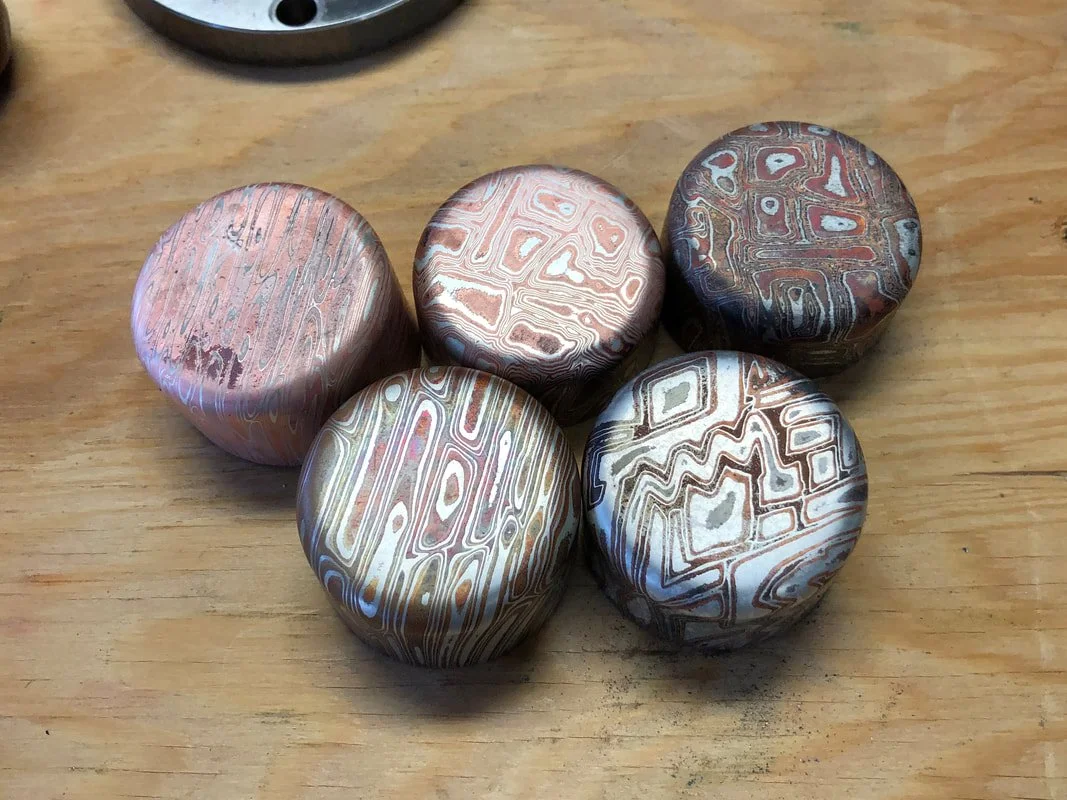 Mokume gane sake cups straight from the press