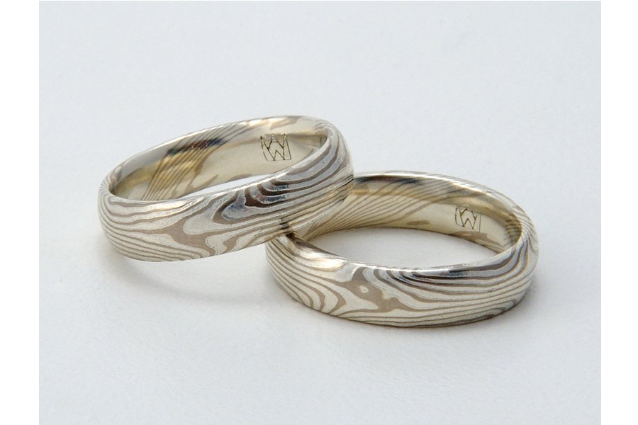 Flowing star patterned mokume, in 14k palladium white gold and sterling silver (WS). Light etch.