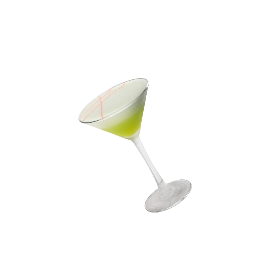 Cocktail vert dans un verre à martini avec une touche décorative rouge.