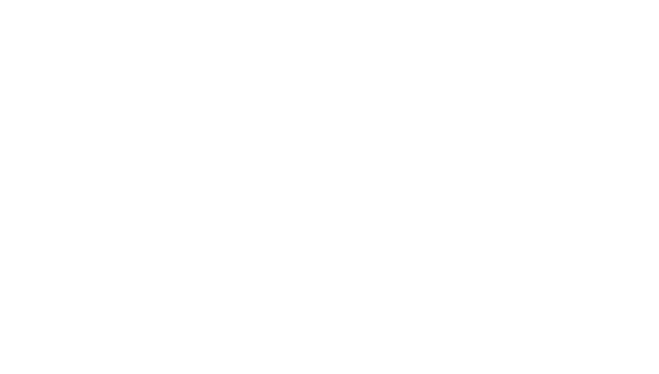 Neon sign displaying the name 'Deja May' in cursive white script on a black background.