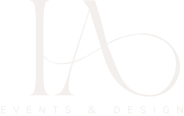 A light-colored logo with the initials 'A' and 'I', and the words 'Events & Design' below.