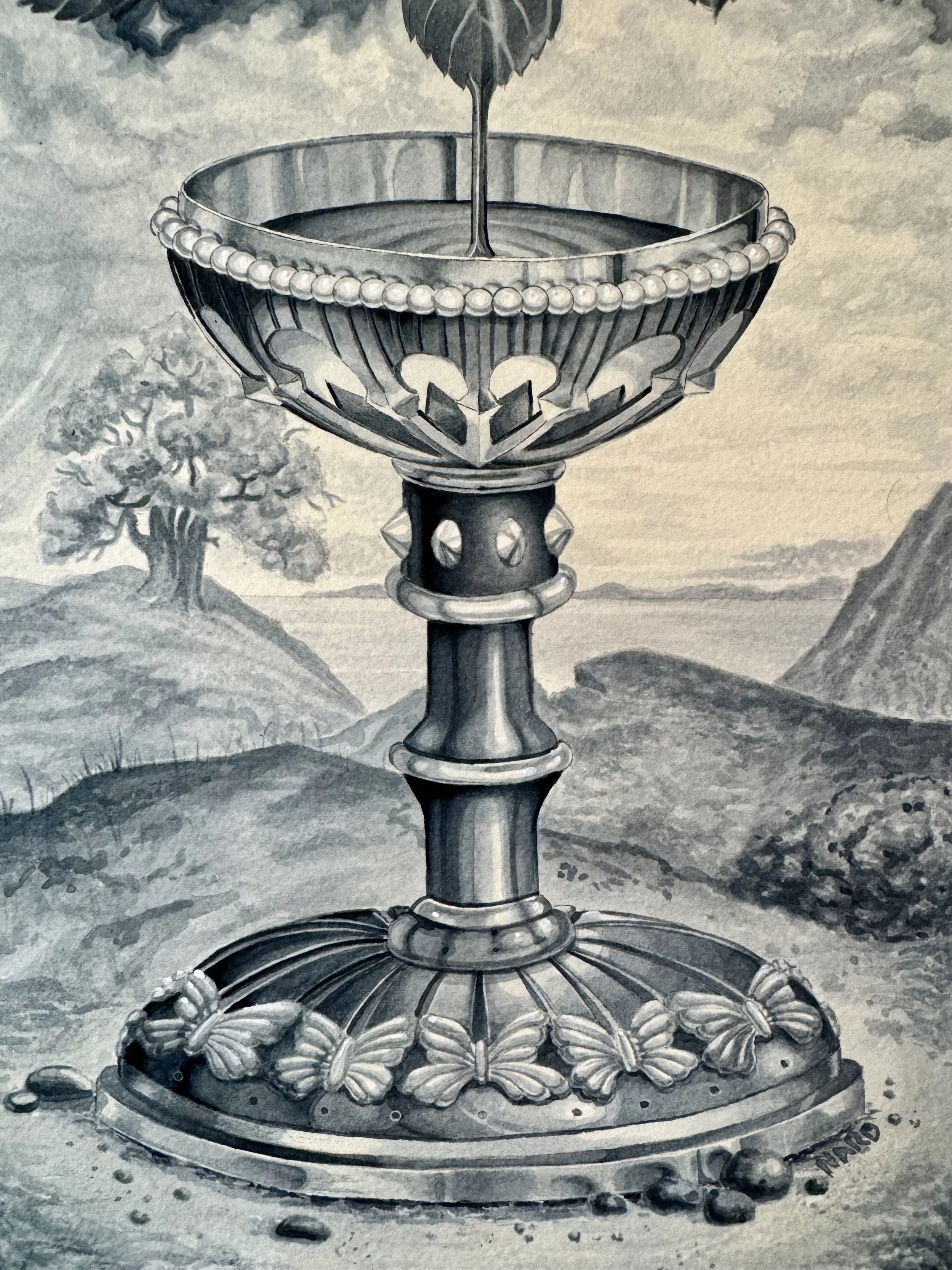 A black and white drawing of a decorative fountain with a wide bowl at the top, supported by a detailed pedestal, surrounded by carved butterflies at the base, set against a background of hills and a clouded sky.