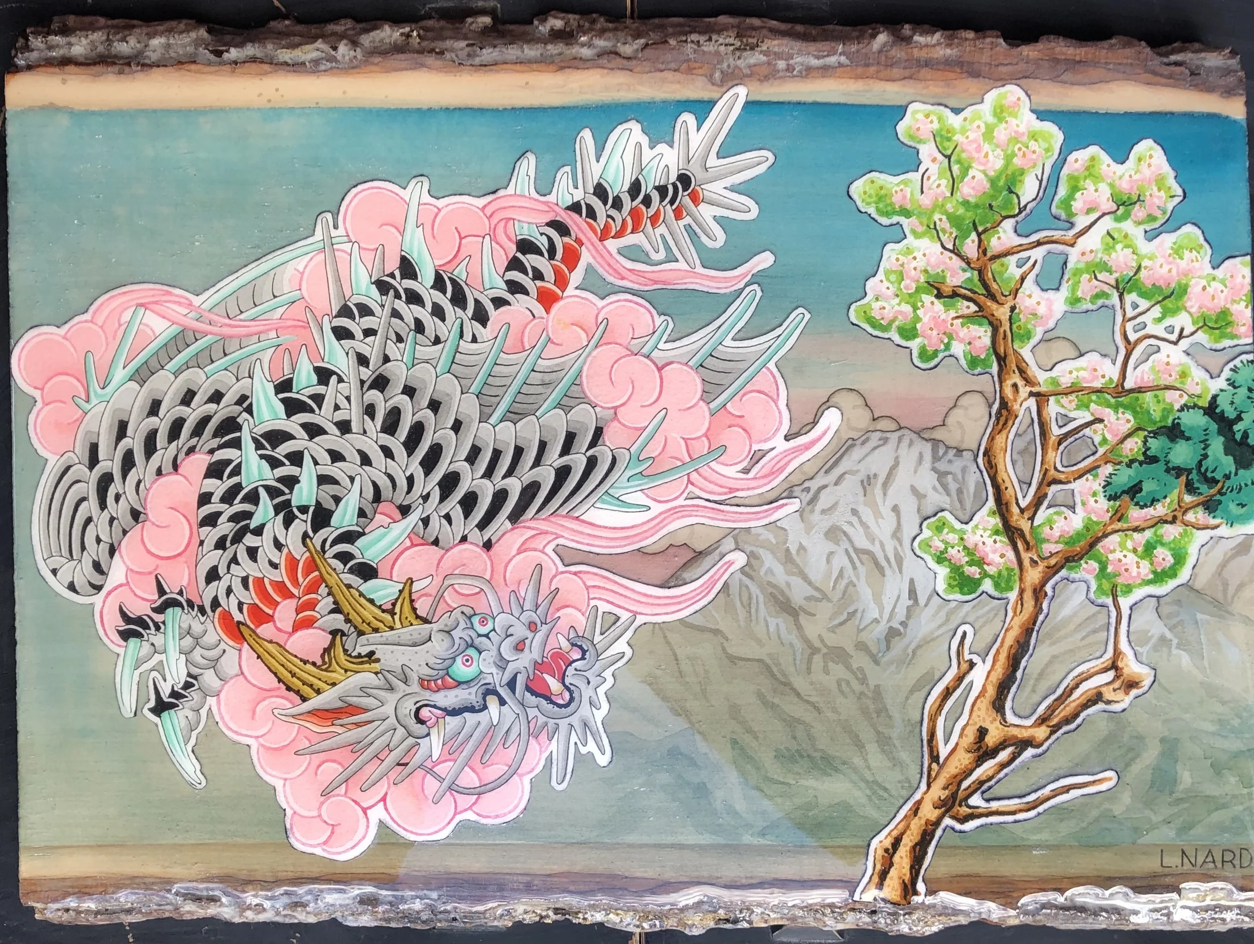 Colorful traditional Japanese-style painting depicting a fierce dragon with pink clouds, floating over a landscape with twin peaks mountains and a blooming cherry blossom tree.