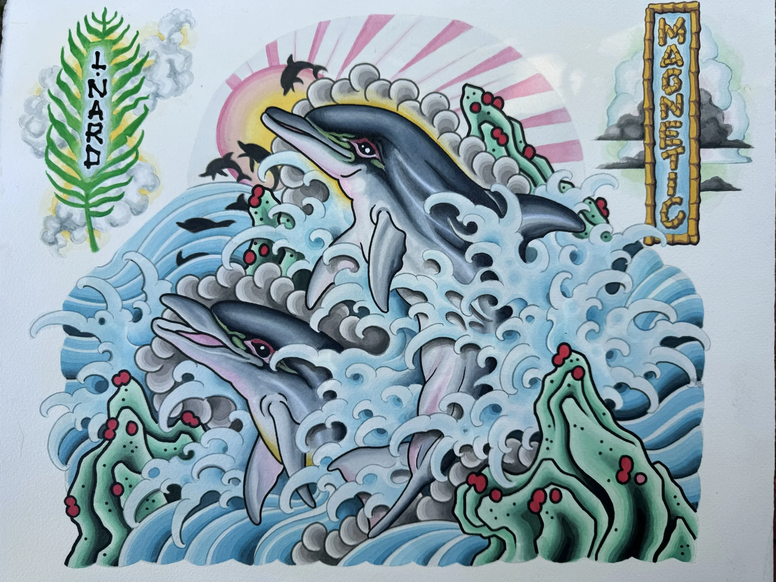 Colorful tattoo-style artwork of two dolphins jumping out of water, surrounded by rocks, waves, and coral, with a sunrise in the background, and banners with the words 'L. Nard' and 'Magnetic'.