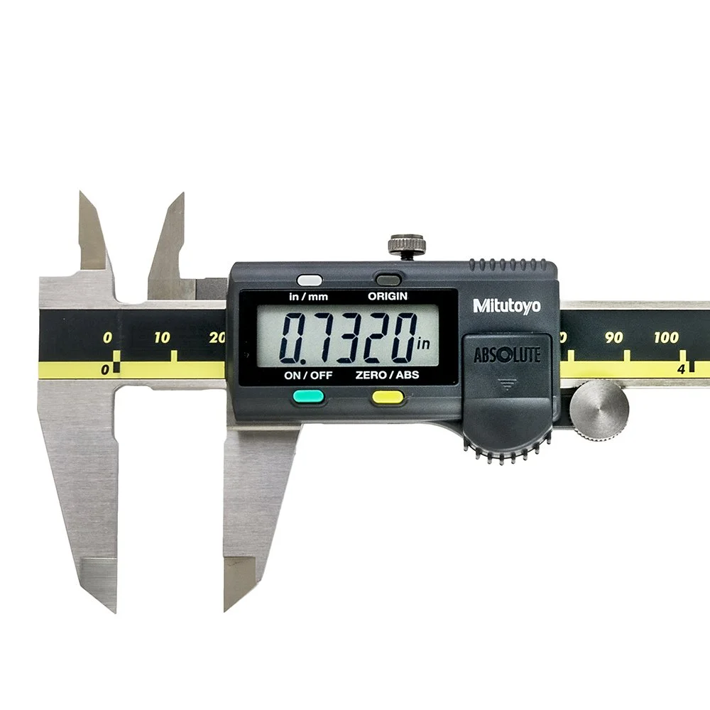 Digital caliper measuring 0.7320 inches.
