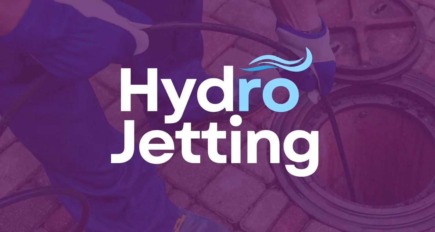 A person performing hydro jetting on a city street drain, with equipment and water nozzle visible, and the text 'Hydro Jetting' overlayed on the image.