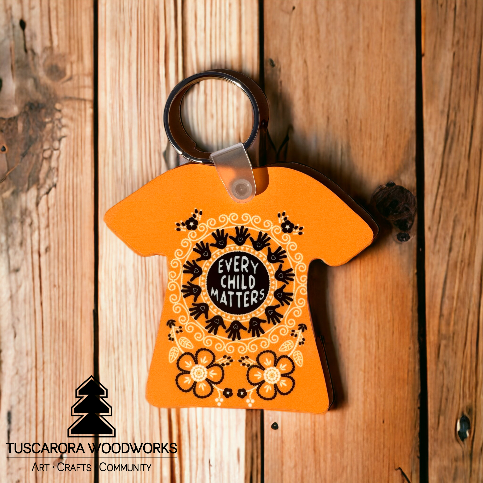 orange_shirt_keychain_-_metal-PhotoRoom__40317.png