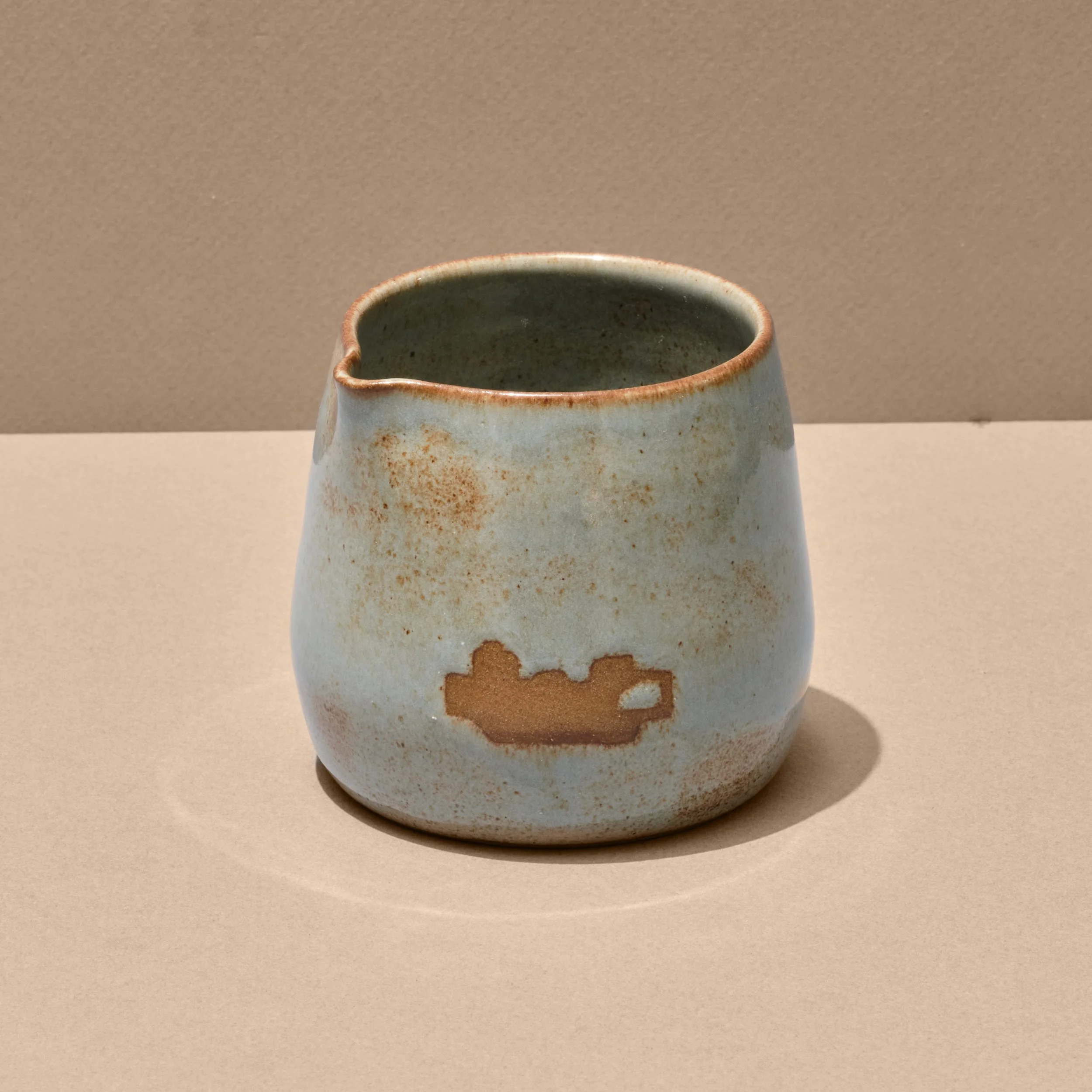 Crossing_Milk_Jug_Wake_Water_Blue_1_FRONT.jpg