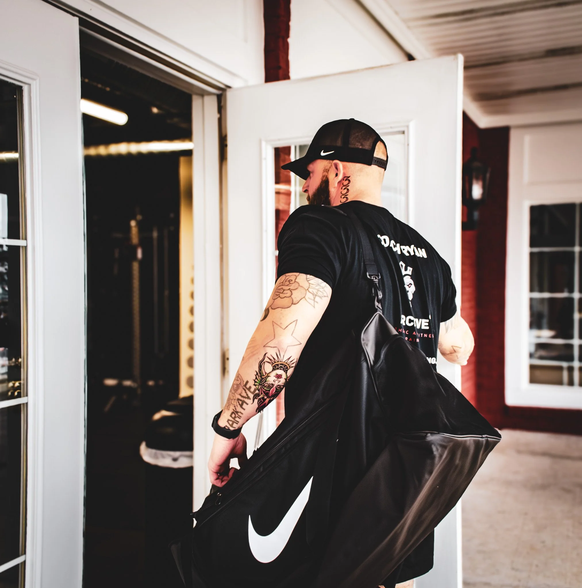 Personal trainer arriving for a coaching session at Archive Fitness Training in Carmel, IN