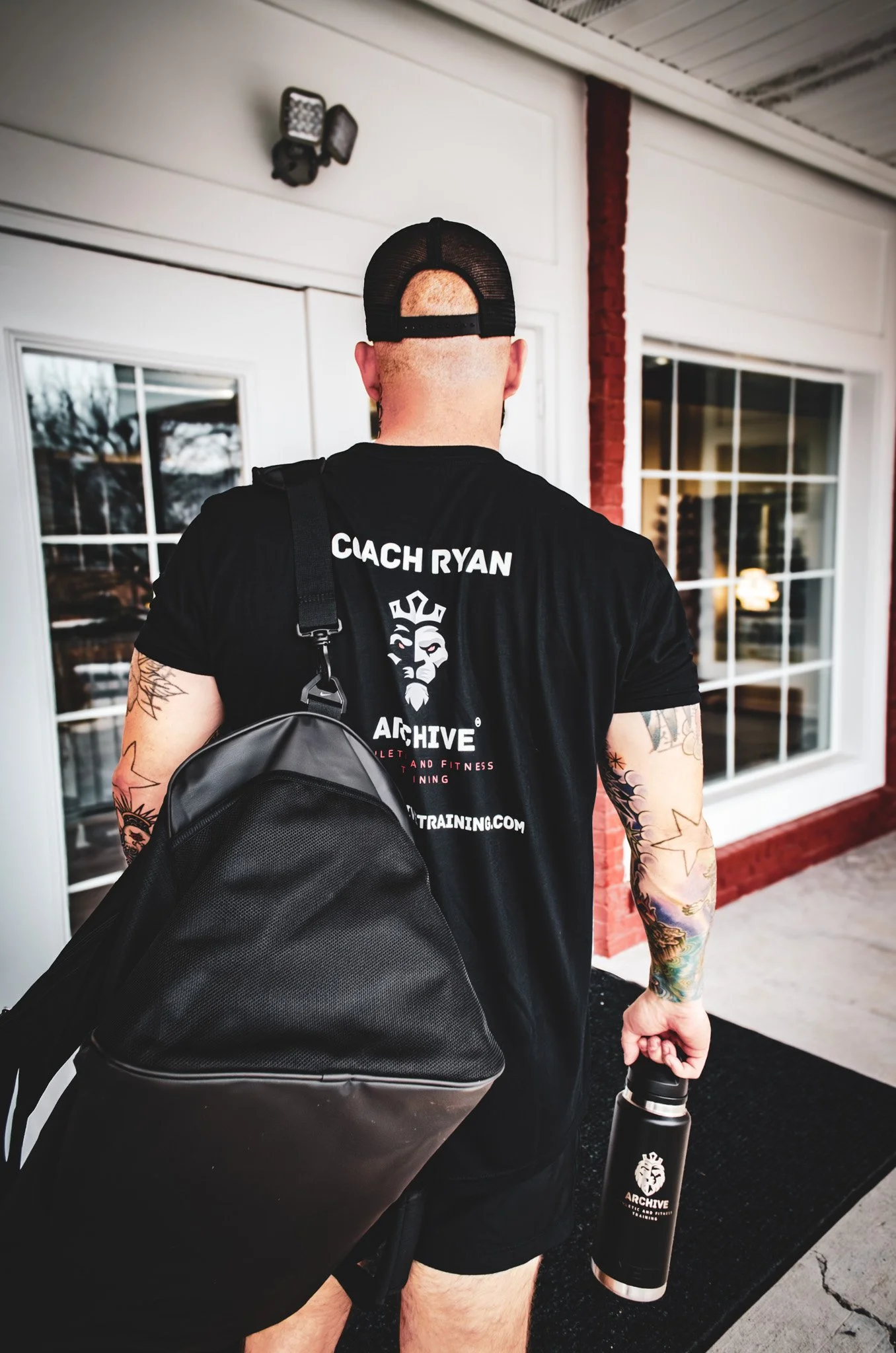 Head personal trainer outside Archive Fitness Training preparing for a client session in Carmel, IN.