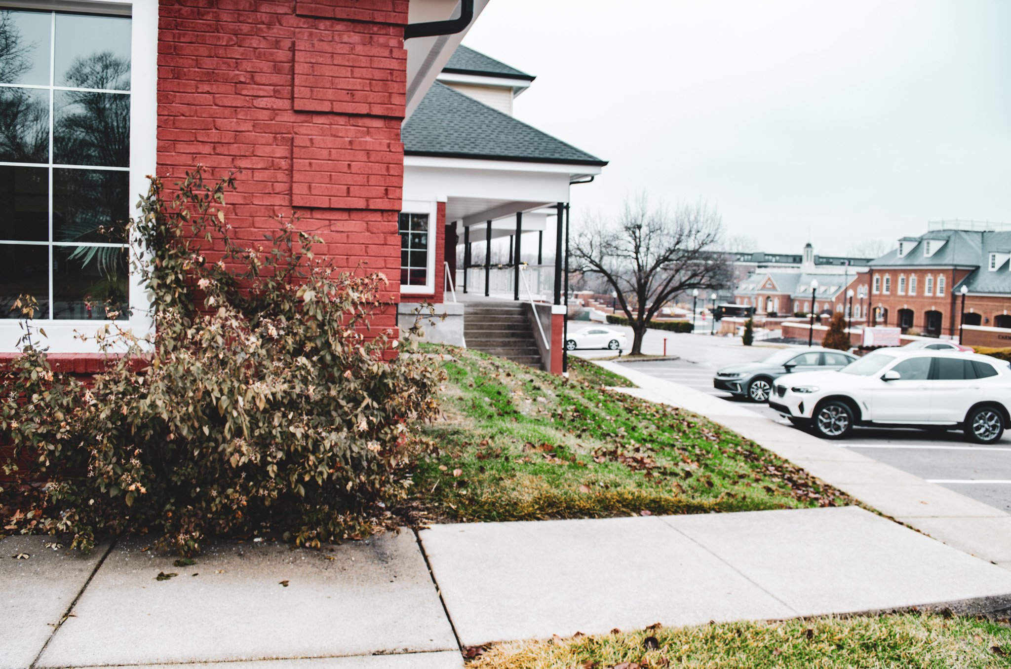 Entrance and parking area of Archive Fitness Training, a private personal training studio in Carmel, IN.
