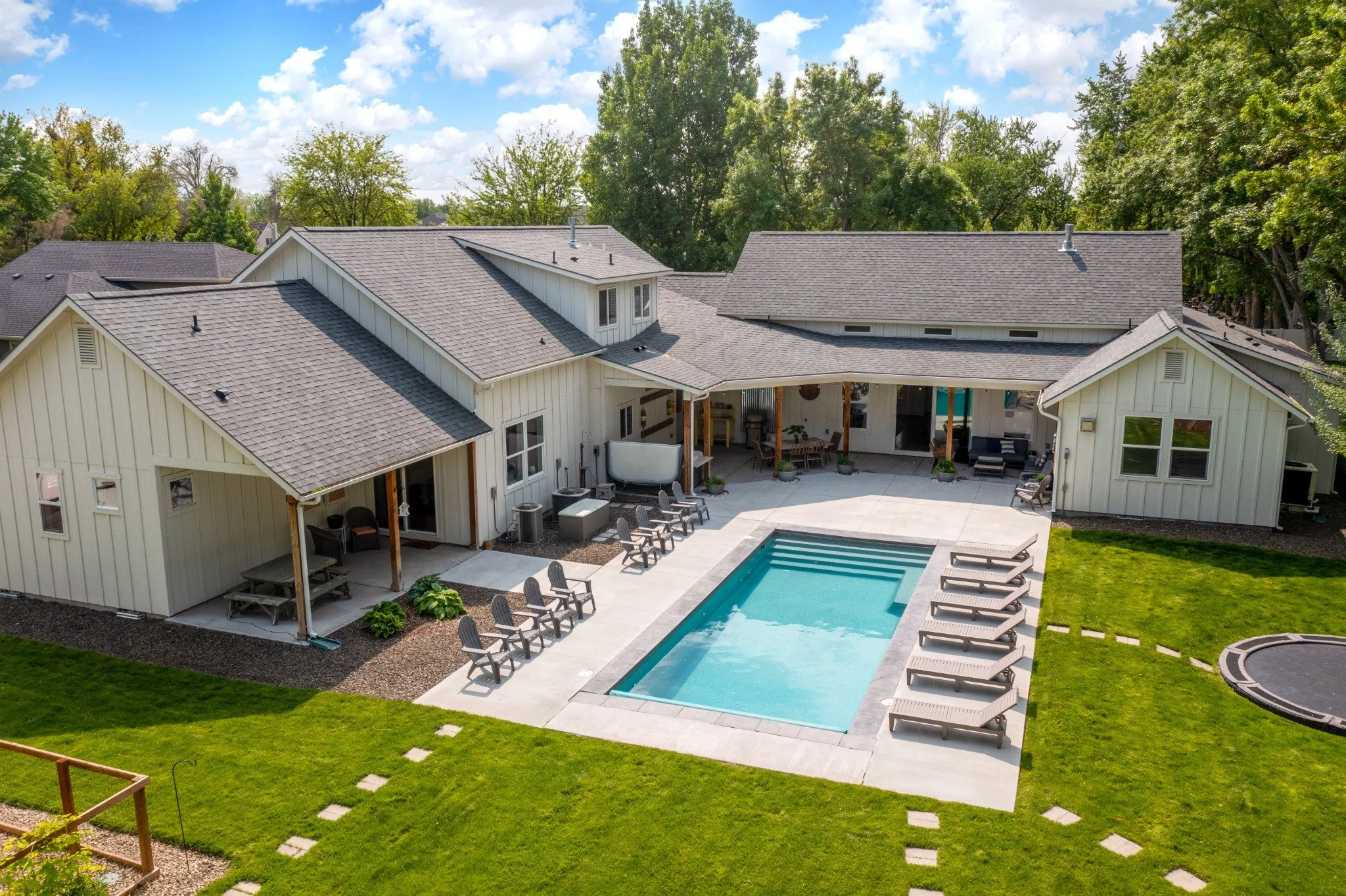 Boise Urban Farmhouse with its private pool and lawn