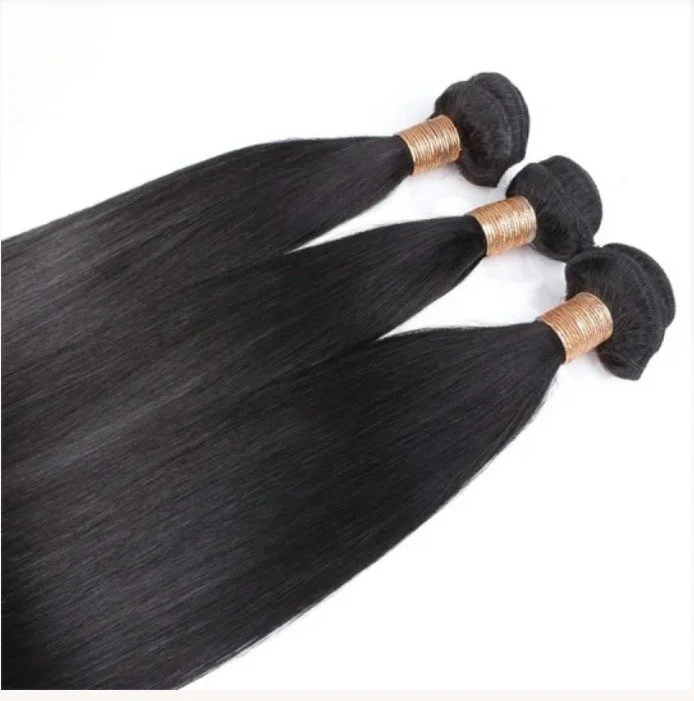 Three bundles of straight black hair extensions with gold-wrapped wefts.