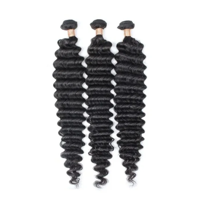 Three bundles of black, curly hair extensions.