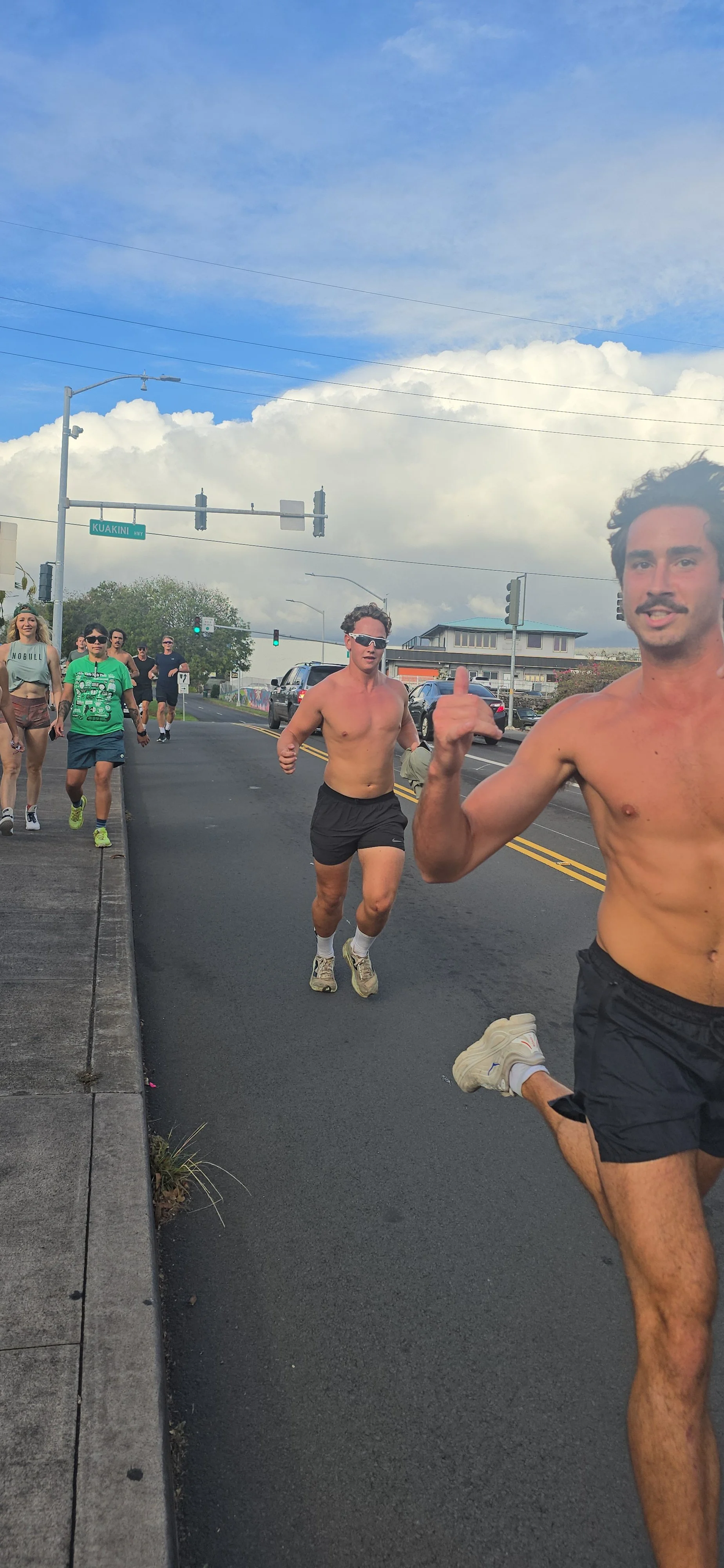 20260321_171058 - runner giving shaka - HiCO kona 5k PIHA Living.jpg