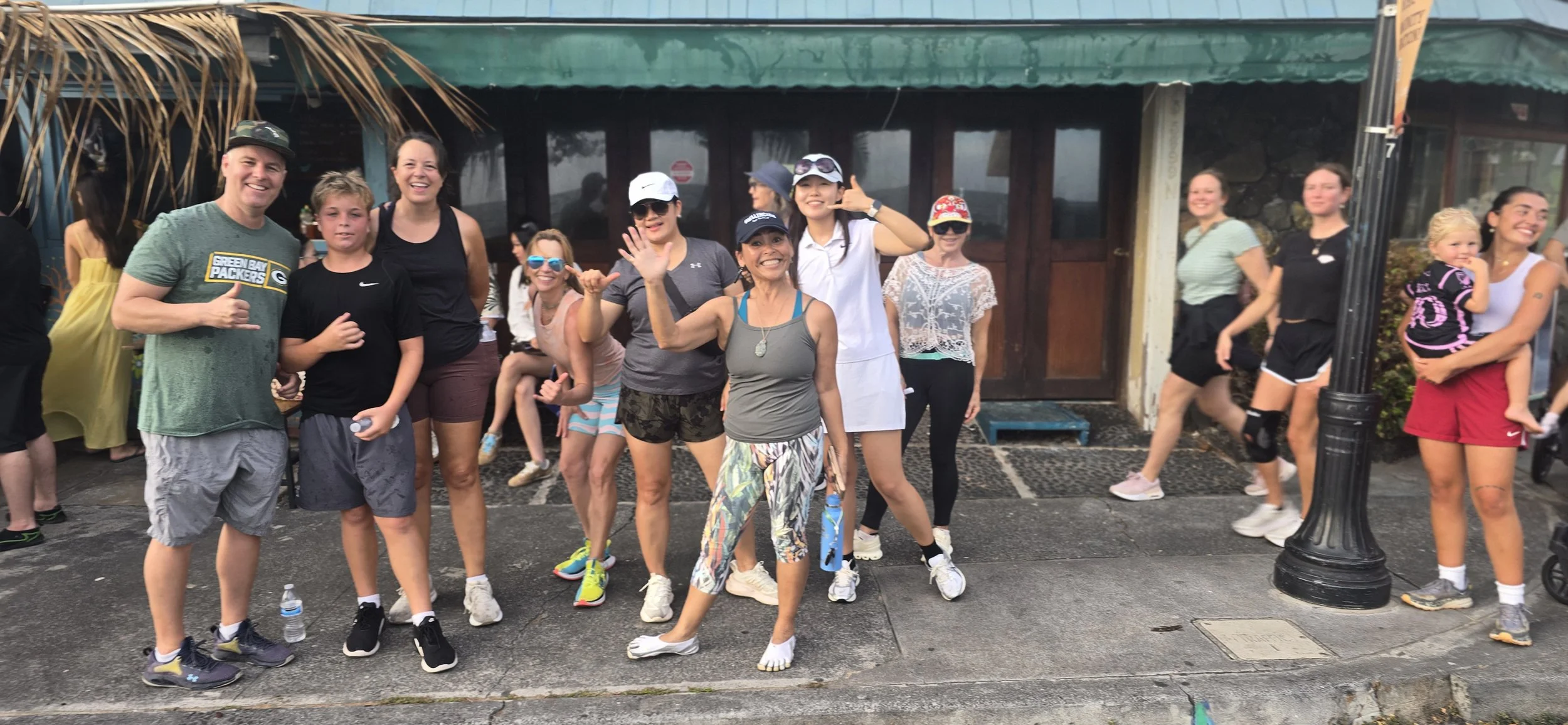 20260321_171646 Walking group waving hello  - HiCO kona 5k PIHA Living.jpg