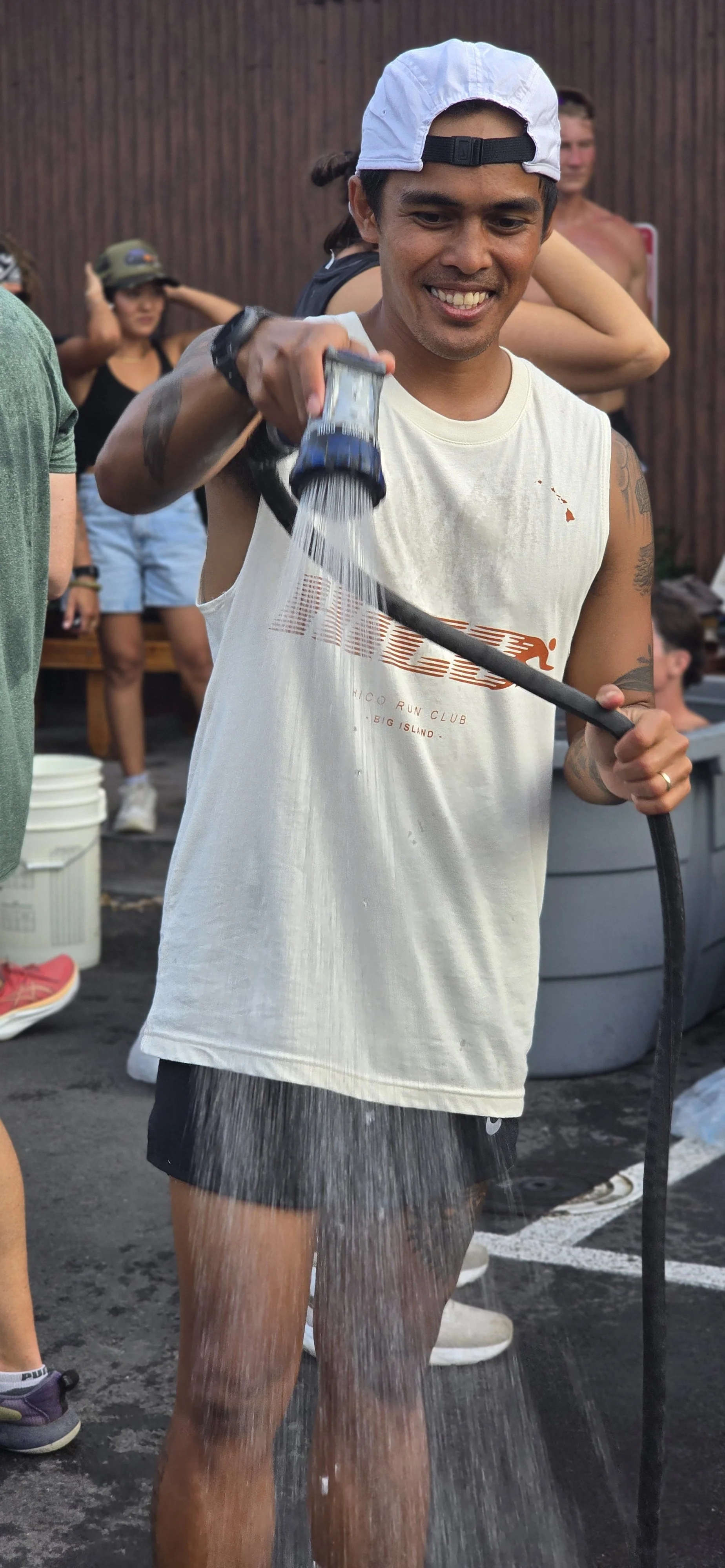 20260321_173657 hosing everyone down for cold plunge - HiCO kona 5k PIHA Living.jpg