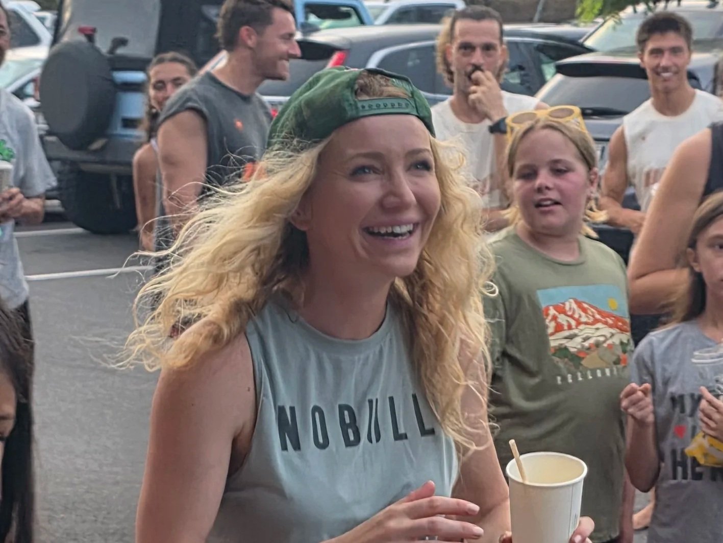 Paige winning a Big Island Running Co trucker hat