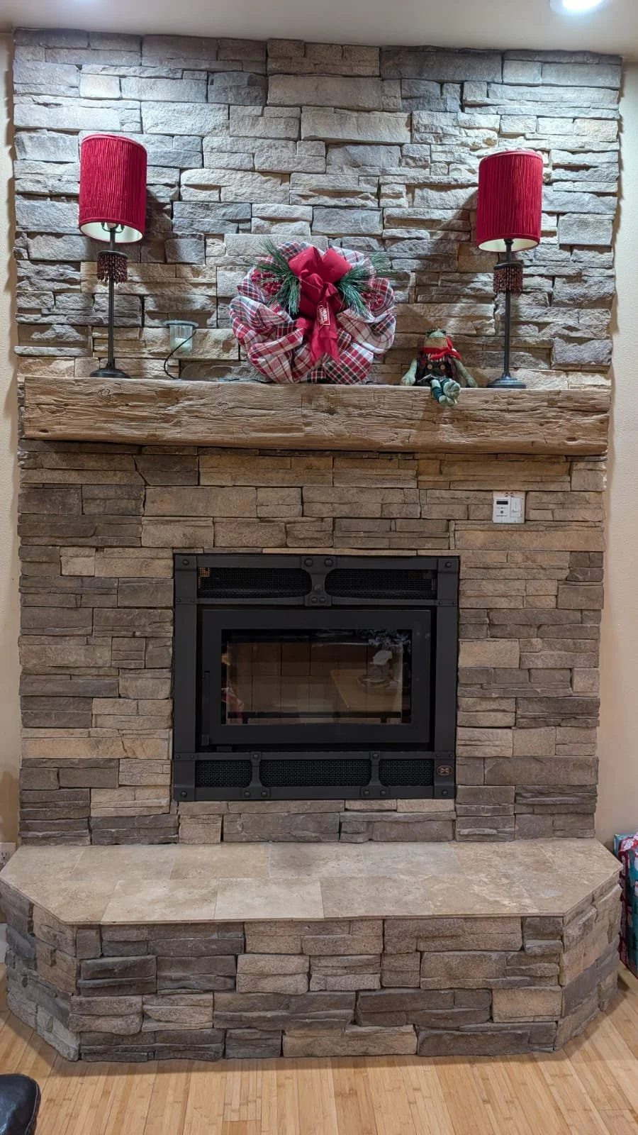Completed stone fireplace with insert