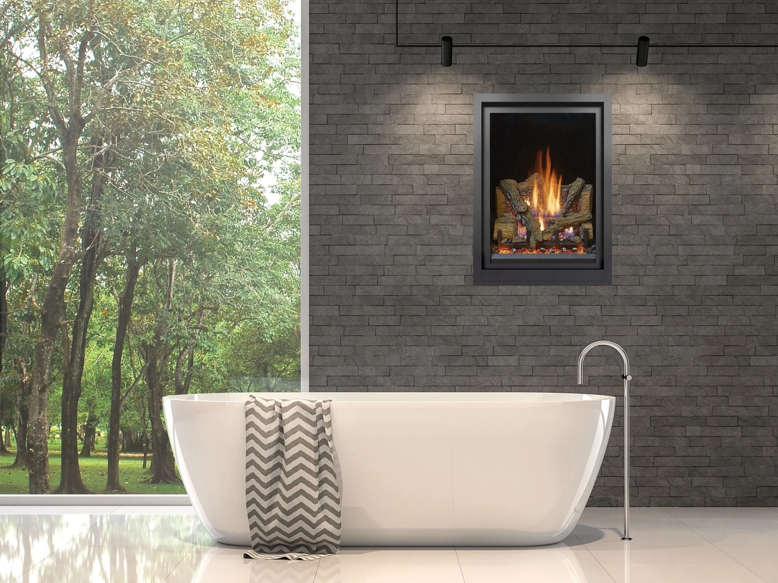 gas fireplace in wall with bathtub in front