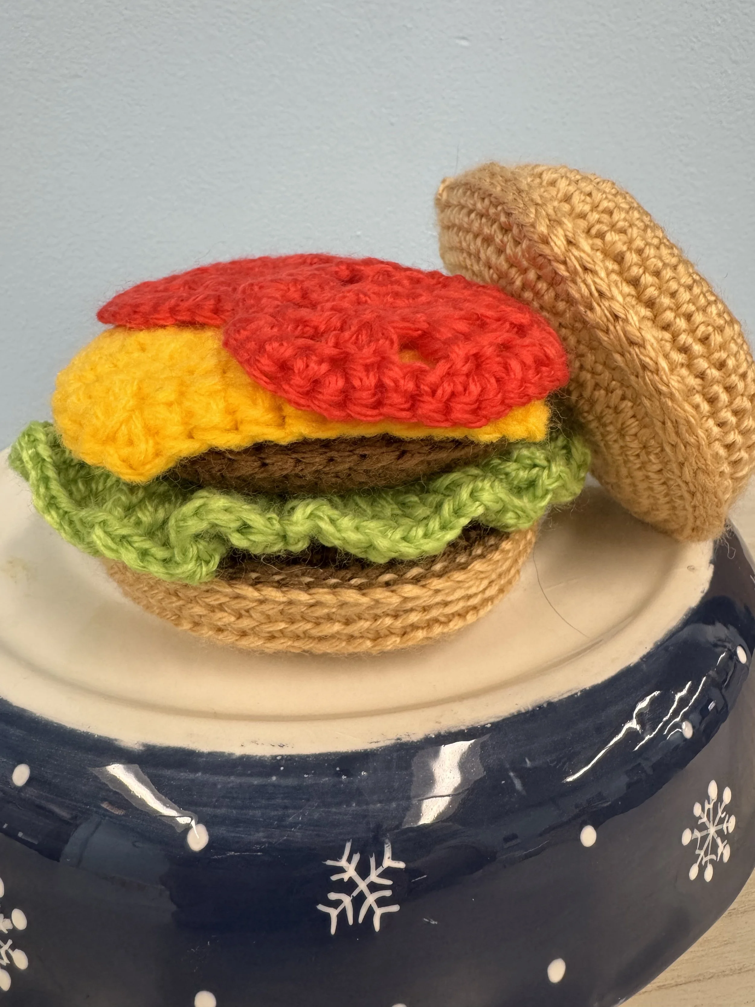 A crochet cheeseburger for a coworker.