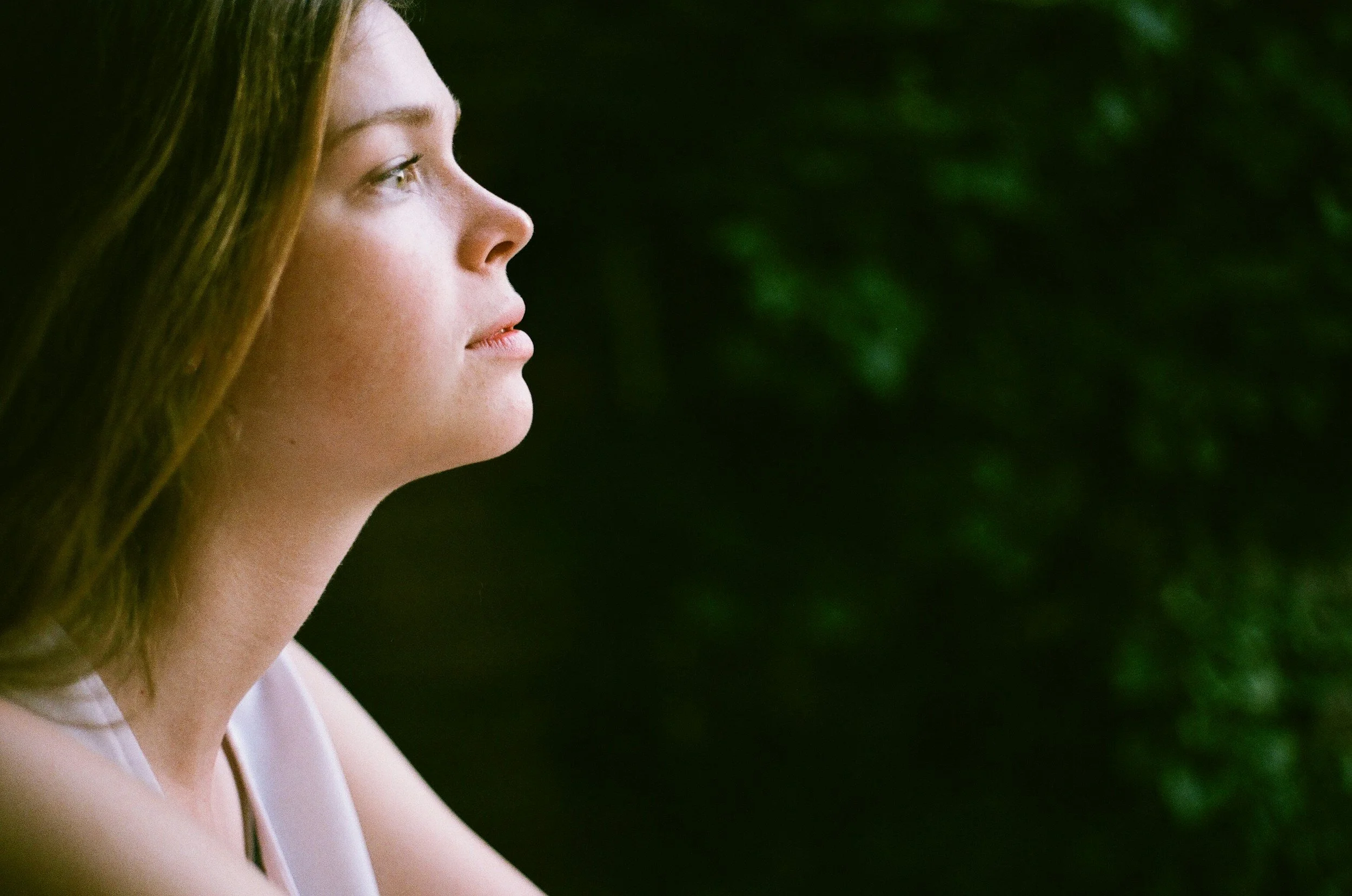 a woman looking pensive