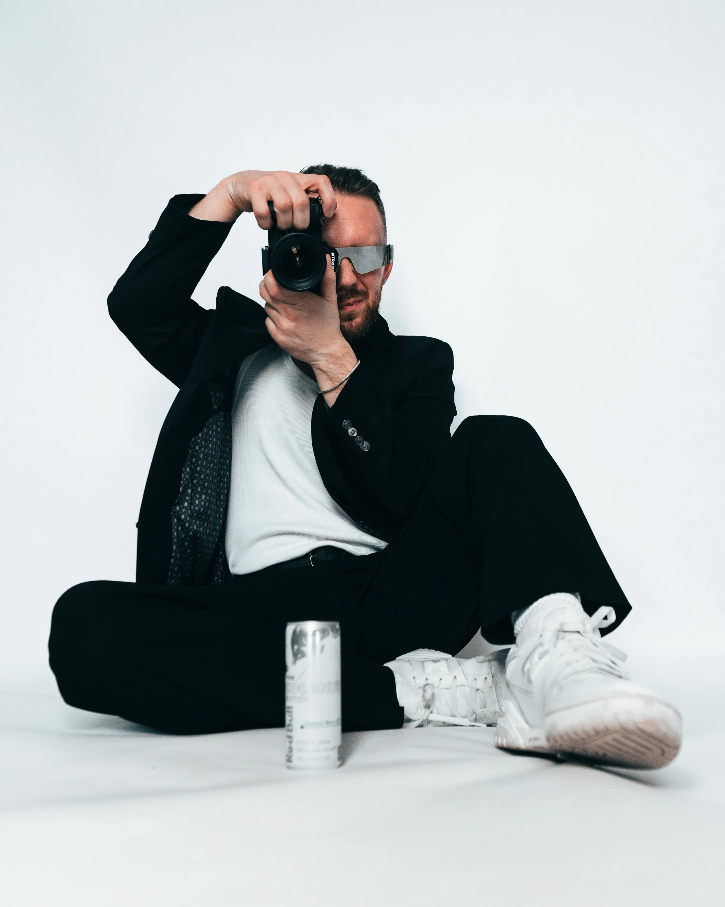 Editorial lifestyle portrait with modern menswear styling, photographed by Spenser Omans.