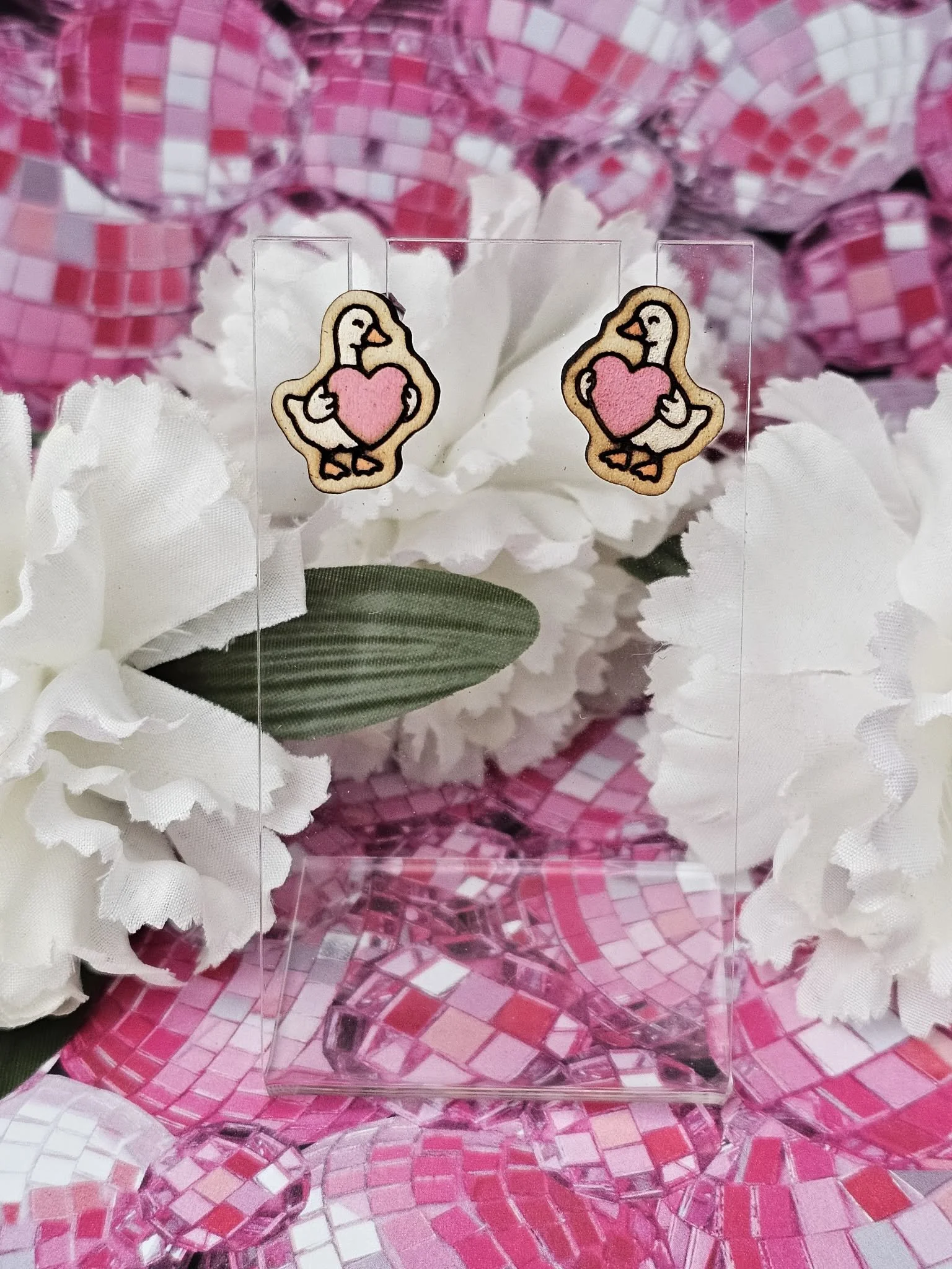 Goose holding a heart.jpg