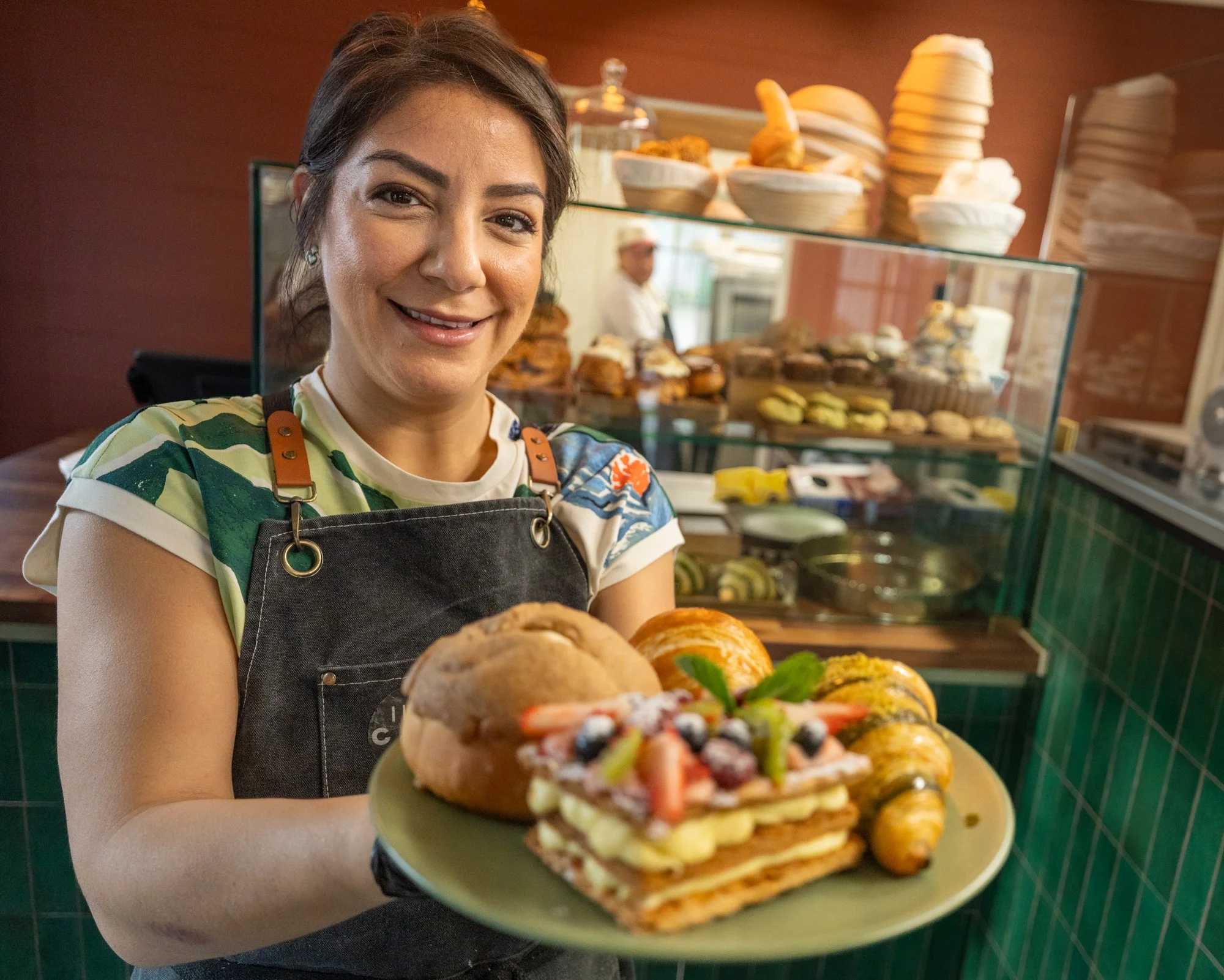 Judith Equihiua with some of her creations at Casa Pan Bakery.