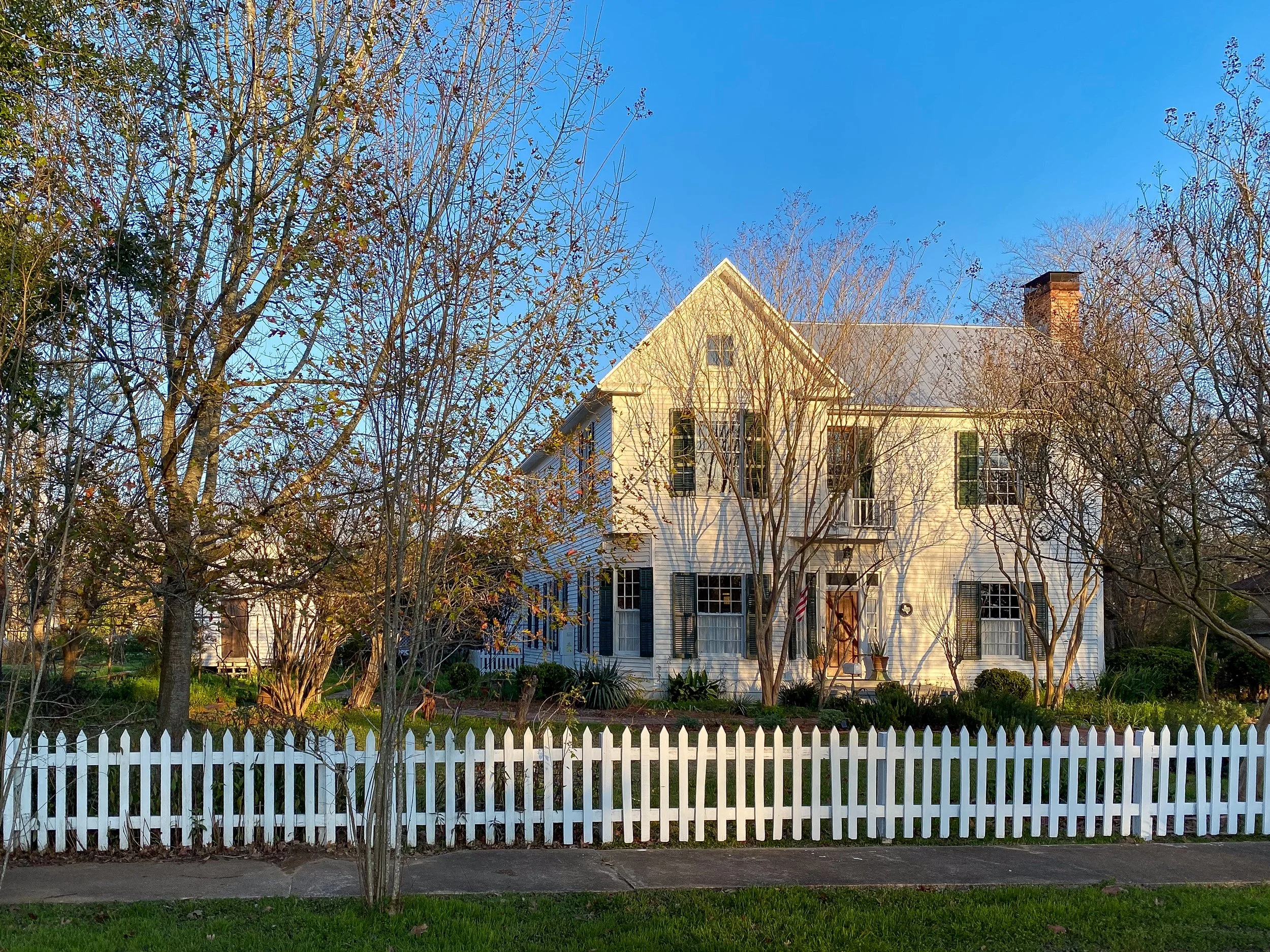 The house was originally built in 1852 as a two-room cottage with a dog-trot passage and an outdoor kitchen. The second story was added in 1910.  It has been in the family since 1959. 
