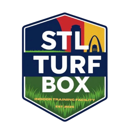 Logo with the text "STL Turf Box," including a red, yellow, and blue color scheme, grass at the bottom, and an indoor training facility sign with the establishment year 2026.